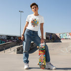White non-binary person wearing a white autism awareness puzzle piece t-shirt.