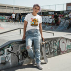 White non-binary person wearing an It is Okay to be Different giraffe t-shirt in a streetwear style.