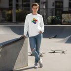 Non-binary person wearing a white puzzle heart logo autism awareness sweatshirt.