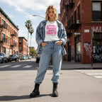 White woman wearing a white t-shirt in a streetwear style photo.