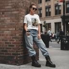 White woman streetwear streetwear shot featuring a person in urban apparel.